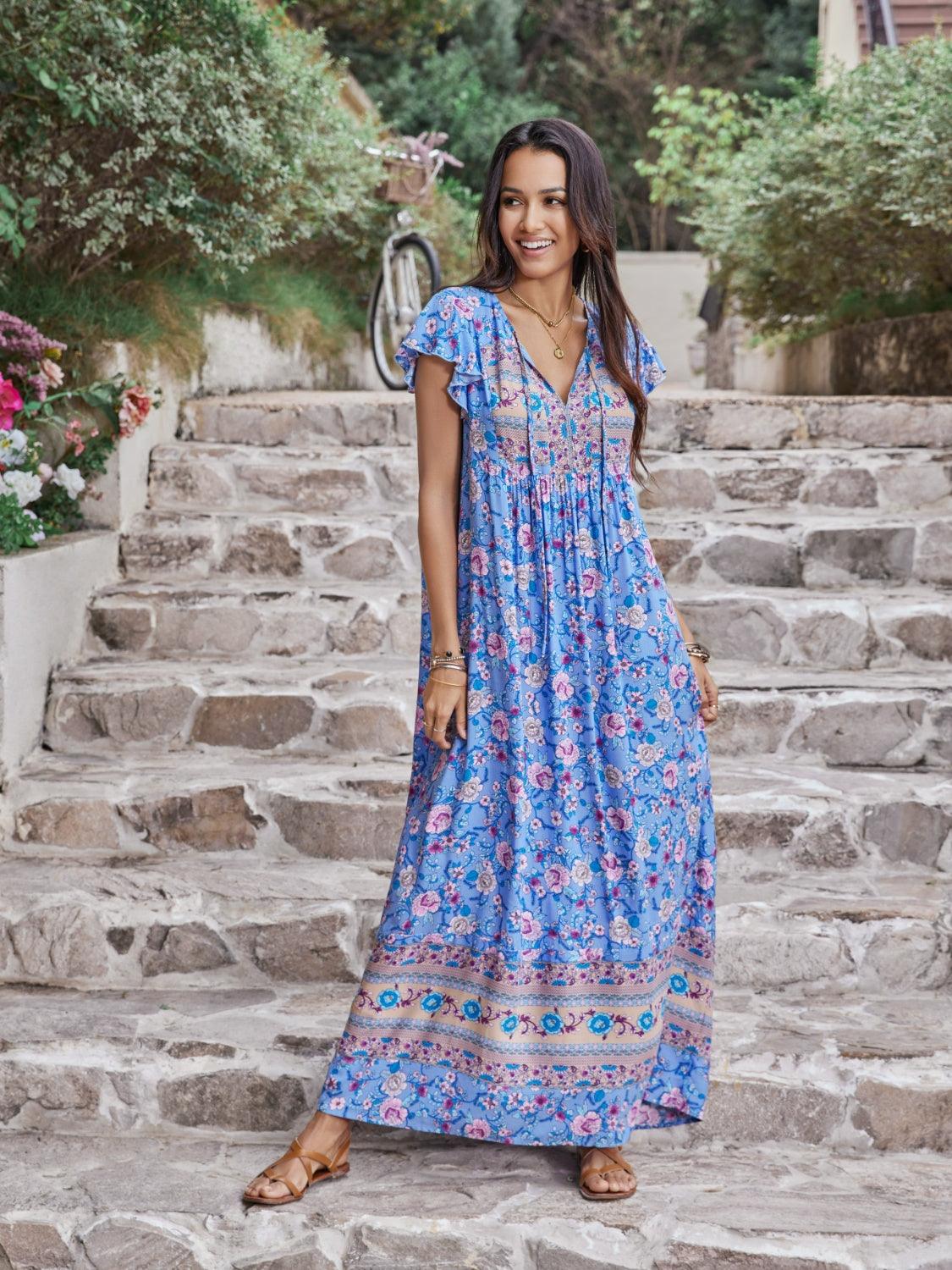 Ruffled Printed Tie Neck Cap Sleeve Dress Carauana Store
