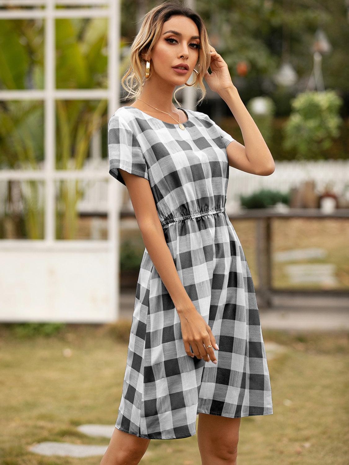 Smocked Plaid Round Neck Short Sleeve Dress CaRaUaNa Fashion