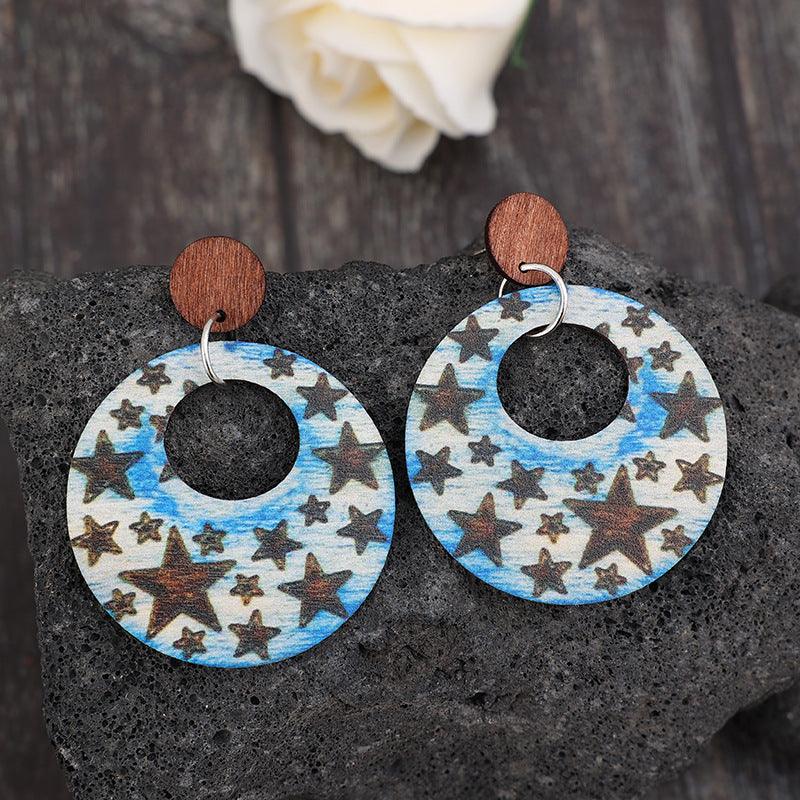 Cutout Star Print Wooden Dangle Earrings CaRaUaNa Fashion