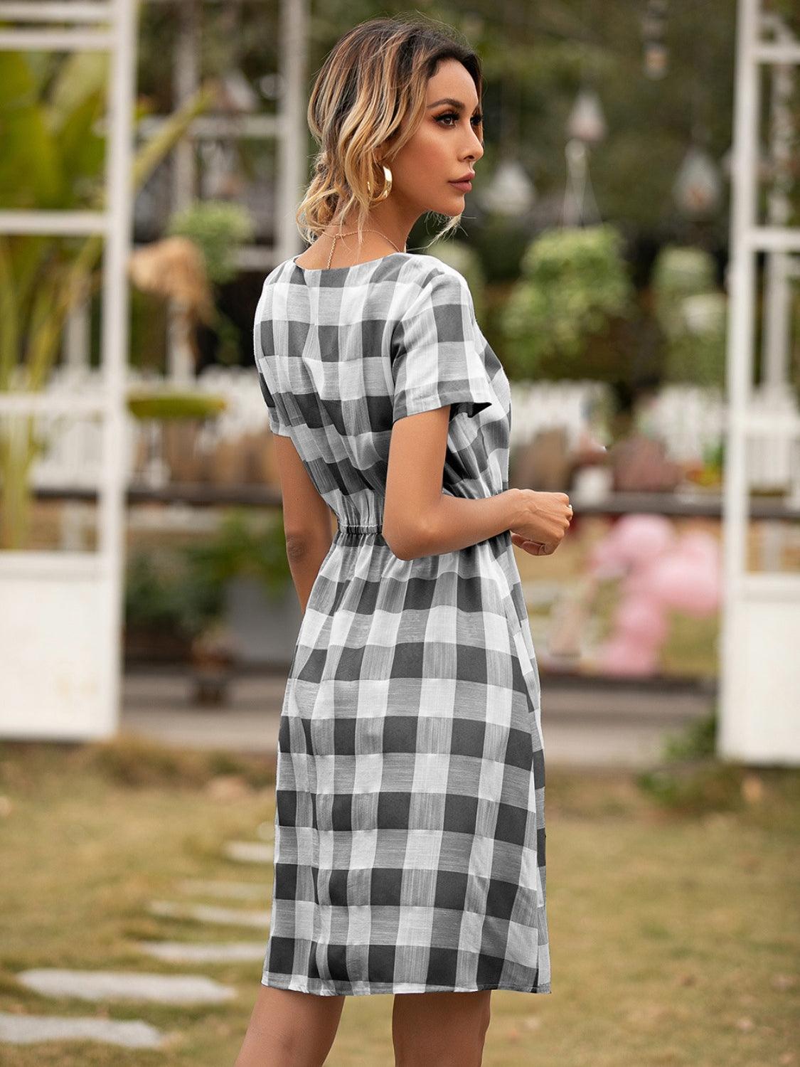 Smocked Plaid Round Neck Short Sleeve Dress CaRaUaNa Fashion