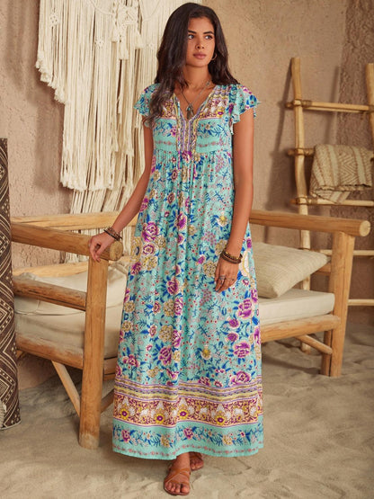 Ruffled Printed Tie Neck Cap Sleeve Dress Carauana Store