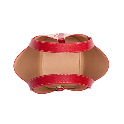 Red leather belt with a gold buckle on a white background