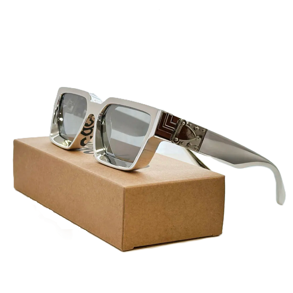 Carauana Millionaire GO with reflective lenses on a brown box