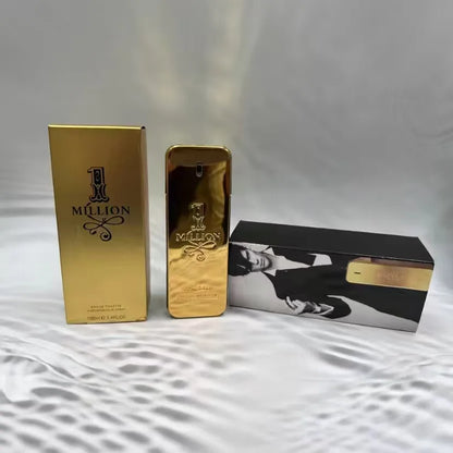 Gold 'Million' perfume bottle and packaging on a white surface