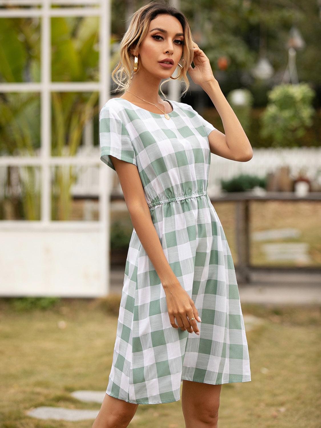 Smocked Plaid Round Neck Short Sleeve Dress CaRaUaNa Fashion