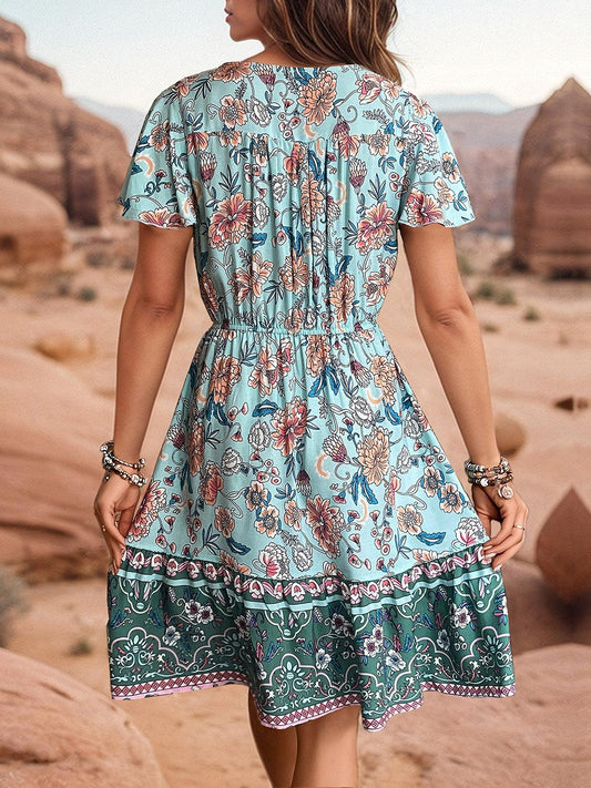 Printed V-Neck Flutter Sleeve Dress Carauana Store